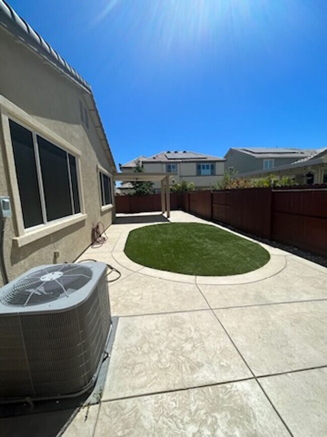 Building Photo - Solar powered open concept home located in...