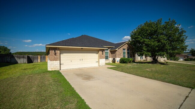 Building Photo - Beautiful 4-Bedroom Home with Spacious Backyard – Conveniently Located Near the New Interstate!
