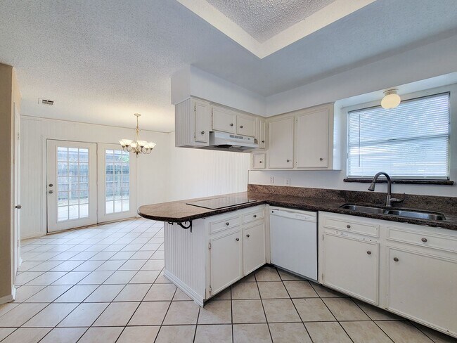Building Photo - Come and view this open floor plan with much potential. Formal and dining room, granite counters,...