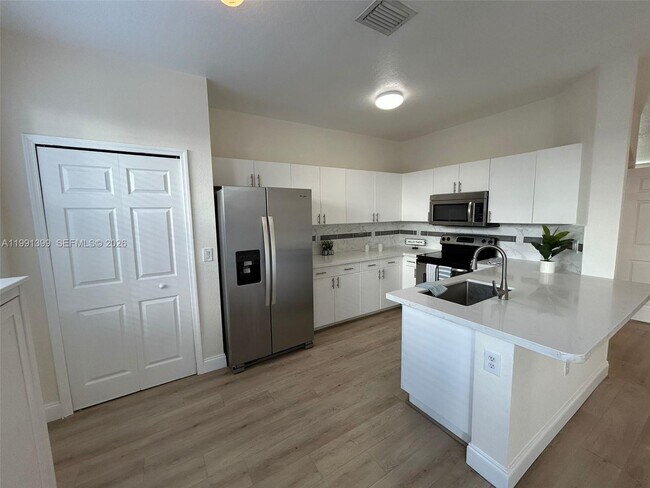 Building Photo - 12515 SW 124th Path