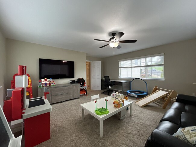 Building Photo - Elegant 5BR + Bonus Room Home with Bay Windows, Entertainment Room & Oversized Primary Retreat