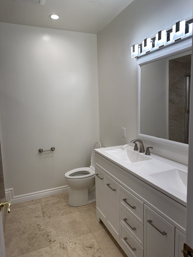 Newly upgraded double sink vanity and bathroom. - 3816 San Augustine Dr