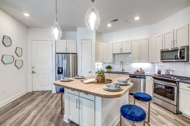 Two Bedroom Model with Butcher Block Islands - 255 Assay