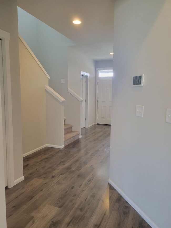 Building Photo - 3 bedroom home with 3 car garage on corner...