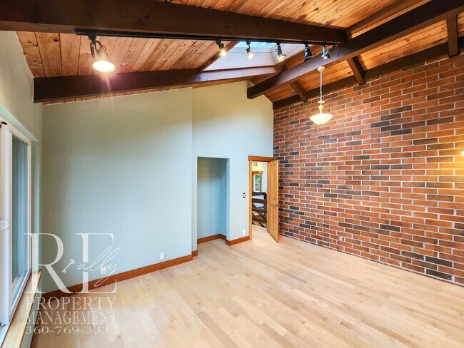 Building Photo - MOVE-IN SPECIAL: 50% OFF FIRST MONTHS RENT - Waterfront Rustic Retreat with Vaulted Ceilings, Pic...