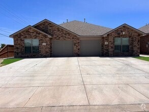 Building Photo - Stylish and Modern 3-Bedroom Duplex for Re...