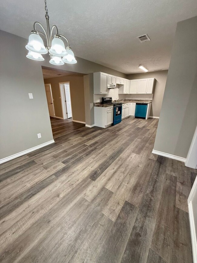 Building Photo - NOW AVAILABLE- 4/2 Completely Remodeled- Never Rented!