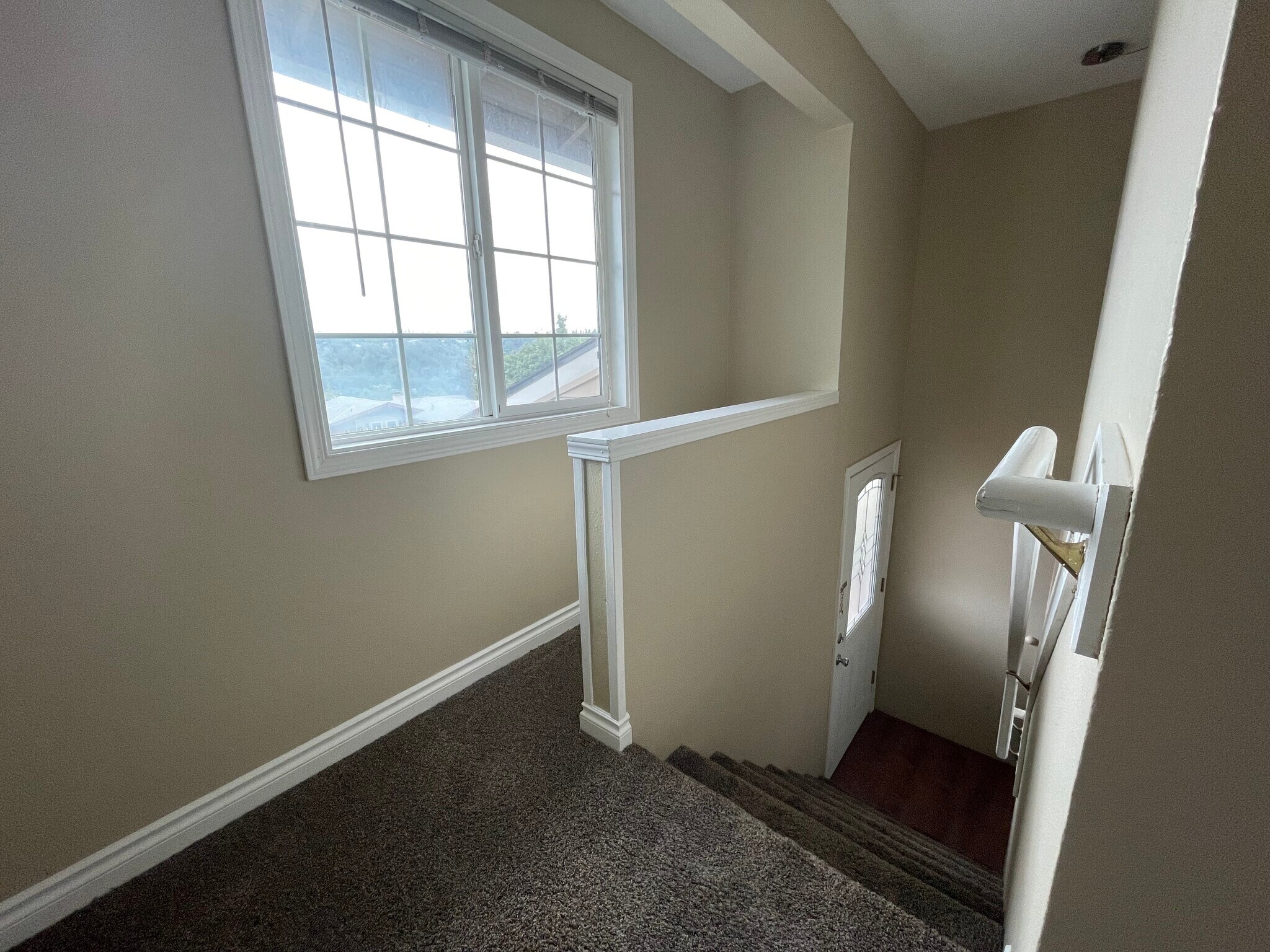 stairs down to front entry - 4368 Imperial Dr