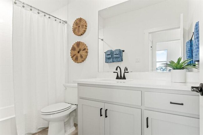 Building Photo - Upgraded Mira Lagos townhome with EV Charger and 2 car garage