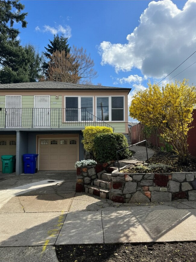 Building Photo - Your Mt. Tabor Oasis: Huge Yard, Oversized Shop-Garage & Sun-Drenched Living!