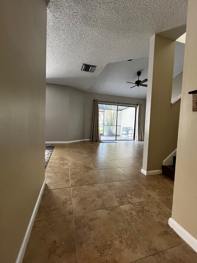 Tiled first floor with clean grout - 1694 SW Crossing Cir