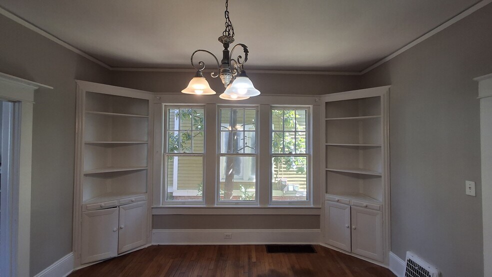 built in shelving in the dining room - 607 Guilford Ave