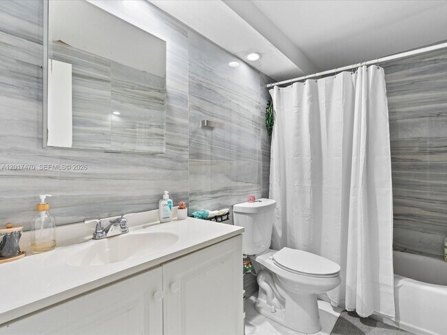Building Photo - 5005 Collins Ave