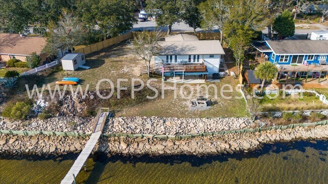 Building Photo - Stunning 4-Bedroom, 3-Bath Waterfront Home in Choctaw Beach – 140ft of Bayfront Bliss!