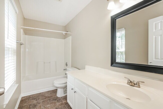 Building Photo - 5209 Carriage Woods Dr