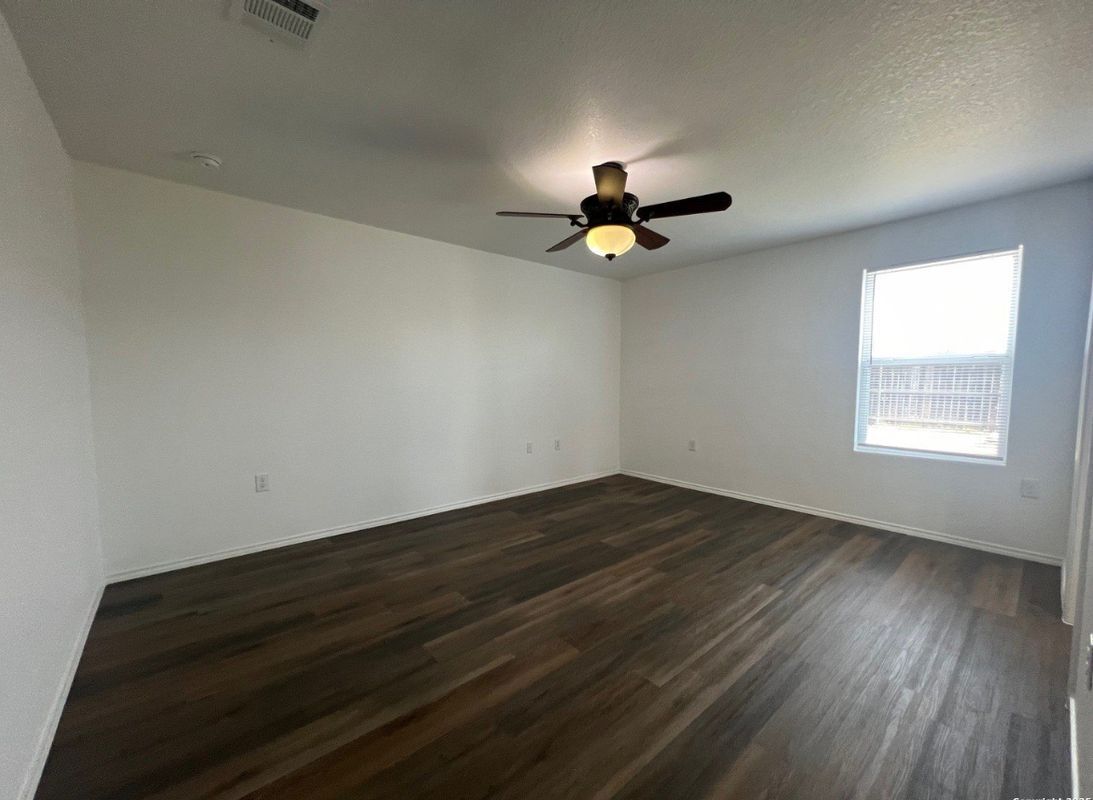 Building Photo - 7002 Cozy Run