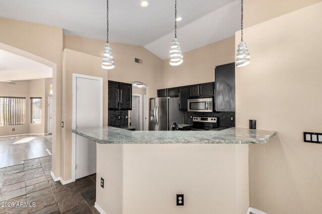 Building Photo - 8642 W Laurel Ln