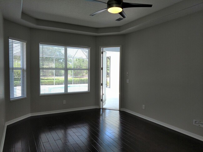 Building Photo - Annual Rental: Luxurious 4 Bedroom 3 bath POOL home in Woodlands of Rivendell! Just Blocks form P...