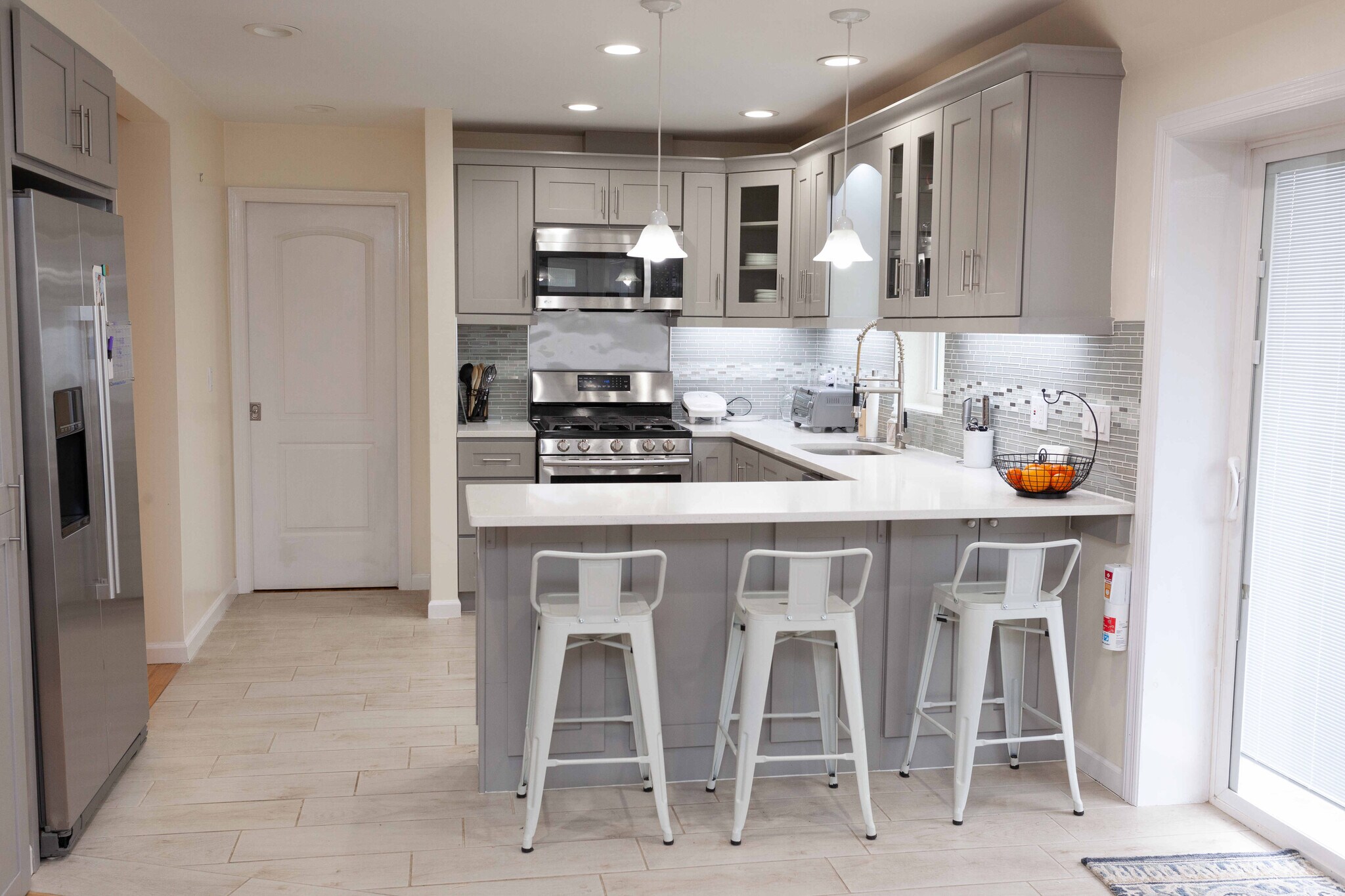 Open Concept Kitchen with Stainless Steel Appliances - 335 E Olive St