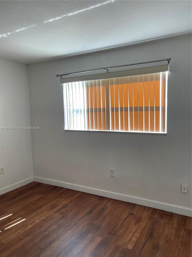 Building Photo - 8515 Sunrise Lakes Blvd