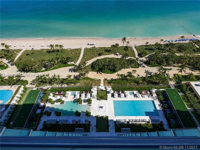 Building Photo - 10201 Collins Ave