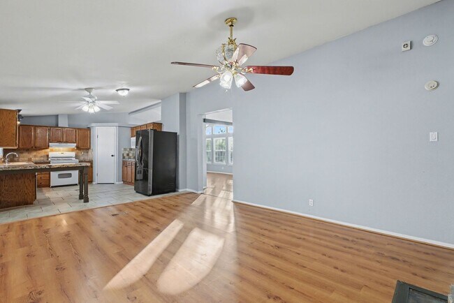 Building Photo - 3-Bed Home with Fireplace, Fenced Yard & Flexible Living Space