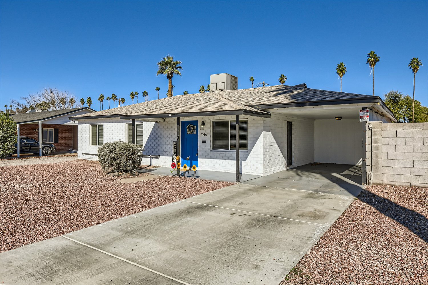 Large driveway and carport - 3146 E Flower St
