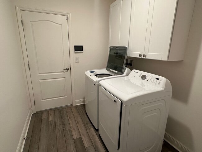 Building Photo - Nearly New 3 Bedroom Smart Home with Lawn Care Included!