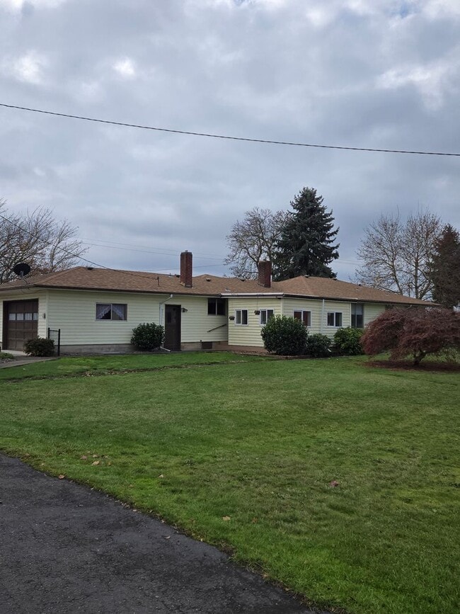 Building Photo - Pet Friendly 3 Bed / 2Bath Home with 2 Garages, Open Air Covered Storage, Large Open Yard, and more!