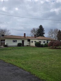 Building Photo - Pet Friendly 3 Bed / 2Bath Home with 2 Garages, Open Air Covered Storage, Large Open Yard, and more!