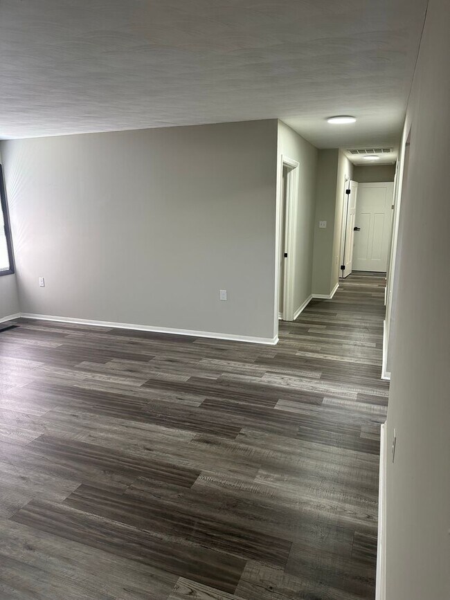 Building Photo - Oversized 3 Bedroom with laundry room!