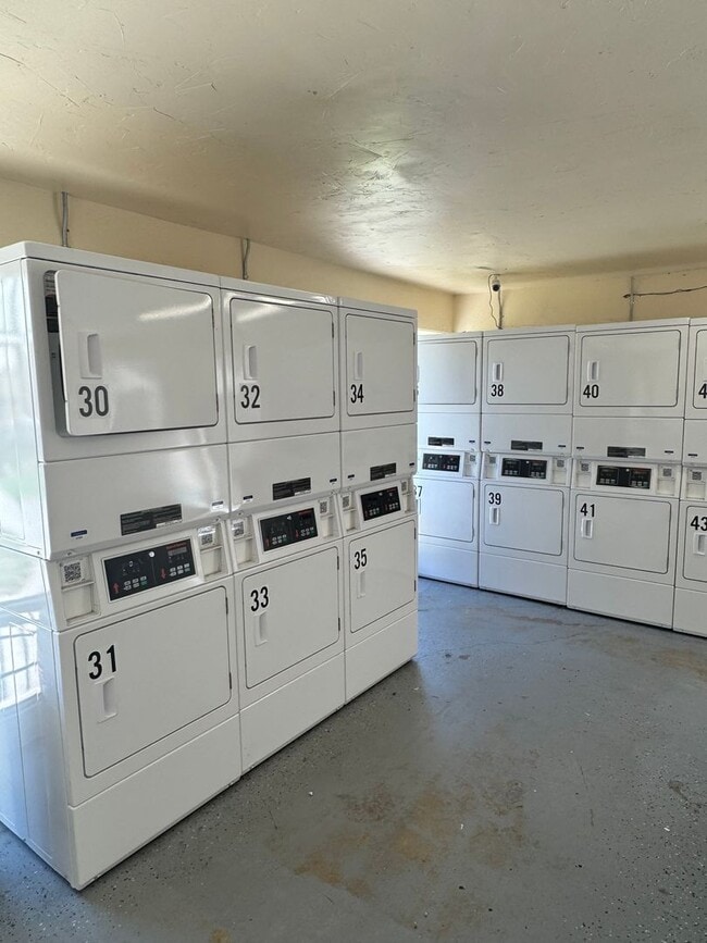 Building Photo - Upstairs two-bedroom 1/12 bath condo avail...