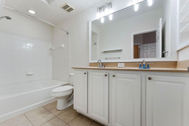 Building Photo - IMMACULATE 2nd Story condominium with so m...