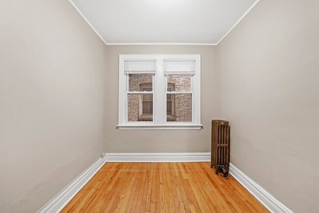 Building Photo - Sunny, Convertible Studio with Two Rooms a...