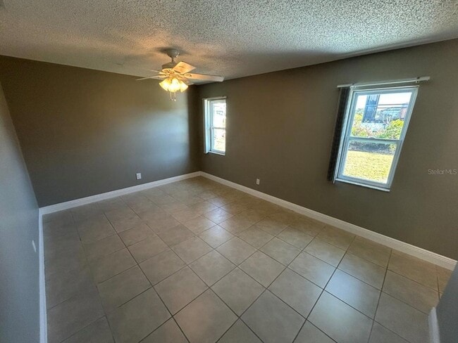 Building Photo - 6525 Manila Palm Way