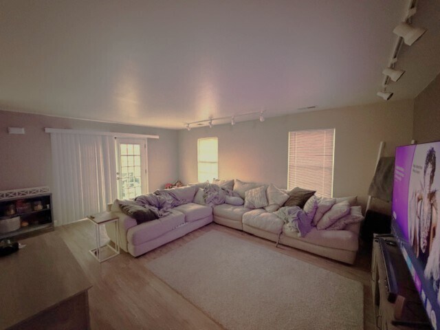 living room - patio door to deck - 408 W Maple St