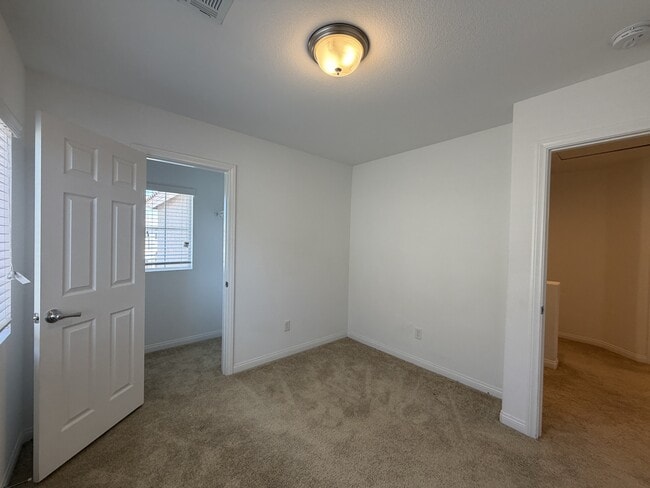 Building Photo - 7869 Tyrell Peaks St