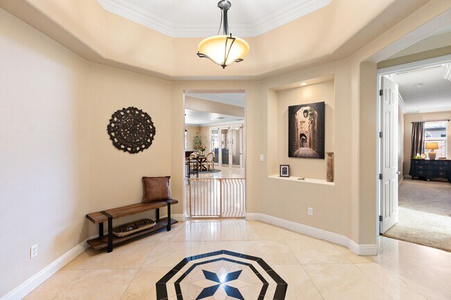 Building Photo - Spacious Mountain’s Edge Home with Den, Sunroom, 3-Car Garage & Private Spa Retreat