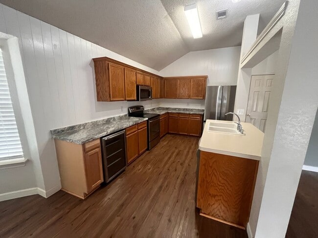 Building Photo - NEW IN MANAGEMENT - AVAILABLE NOW