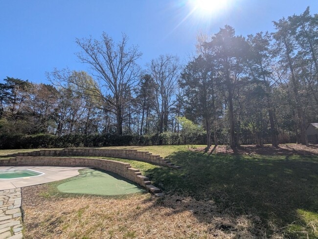Building Photo - Harrisburg with Large Fenced-In Yard, Small Private Pool/Spa and Putting Green