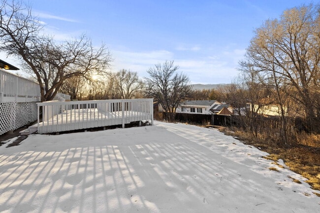 Building Photo - Spacious Split-Level Home with Beautiful Kitchen, Large Deck, and Fully Fenced Yard