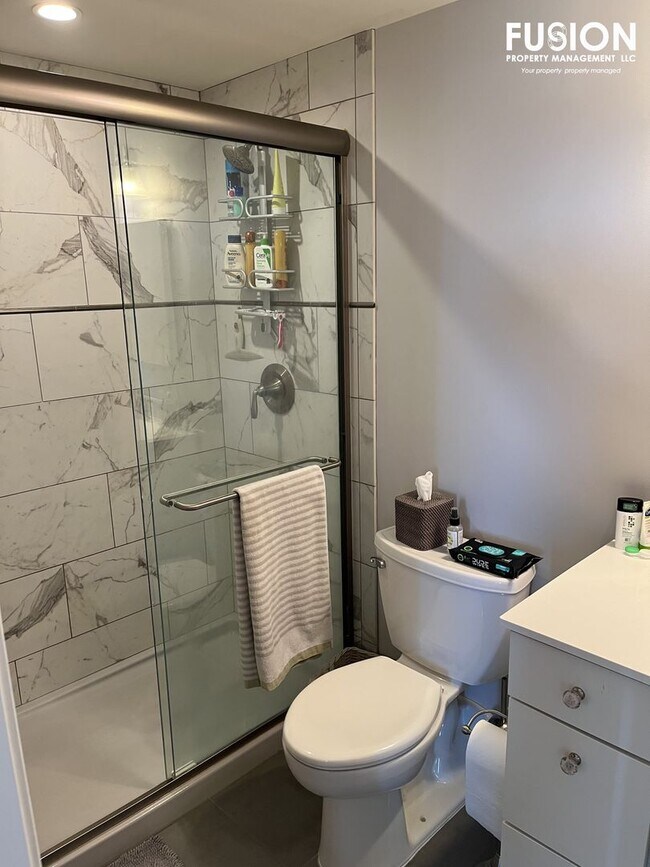 Building Photo - STUNNING LAKE VIEWS - Modern 2BR/2BA Corner Unit in The Vermont House