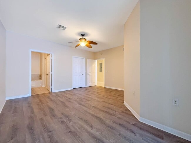 Building Photo - Beautiful 3-Bedroom Condo with 2-Car Garag...