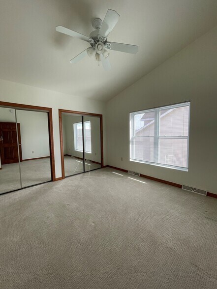 Upstairs side bedroom with double closets - 2034 River Point Ct