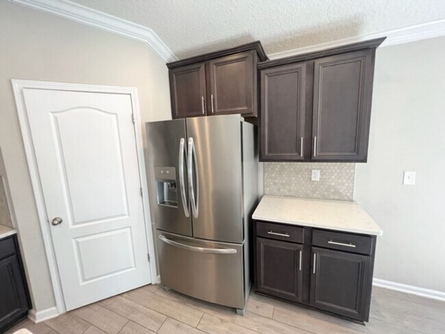 Building Photo - Introducing this stunning 4-bedroom, 2-bat...