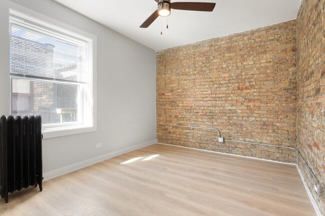 Building Photo - 7383 N Damen Ave