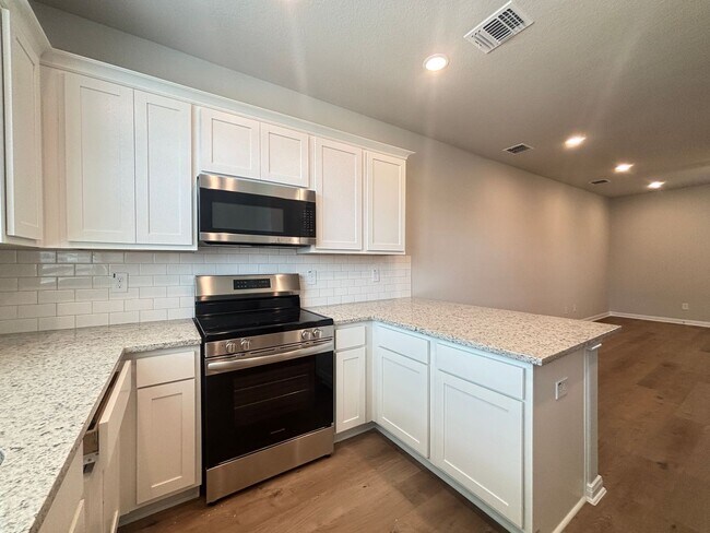 Building Photo - Triple Master Suites 3-Story Townhome