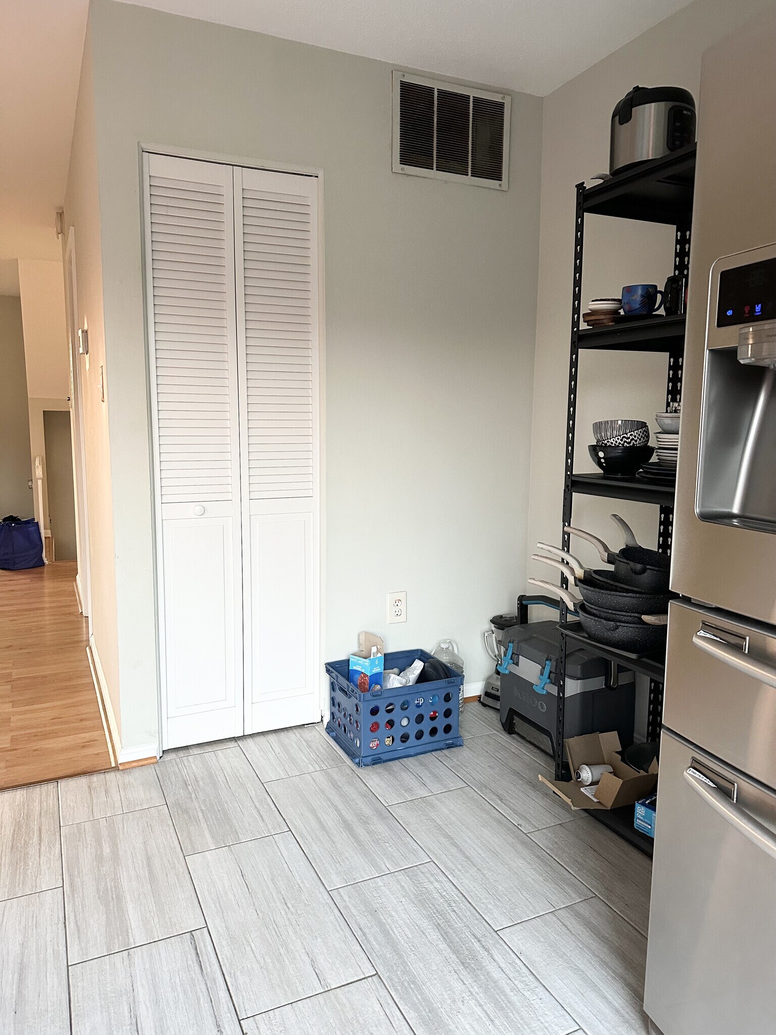 Another view of the kitchen showing the pantry closet and the hallway to the entrance of the home. - 4767 Kandel Ct