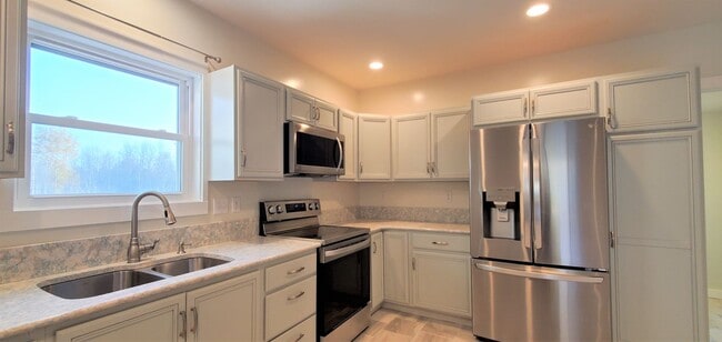 Building Photo - Renovated Farmhouse, 30+ Acres with Pole Barn!