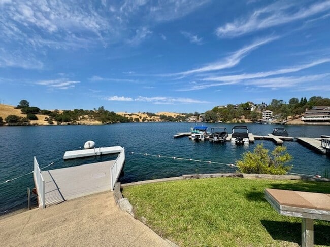 Building Photo - Home located in a gated Lakefront community with 3 swim areas & a boat dock